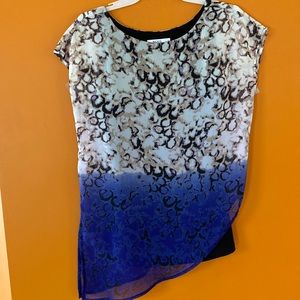 2/$20. Ricki’s asymmetrical blouse in size small two-tone with underlay.